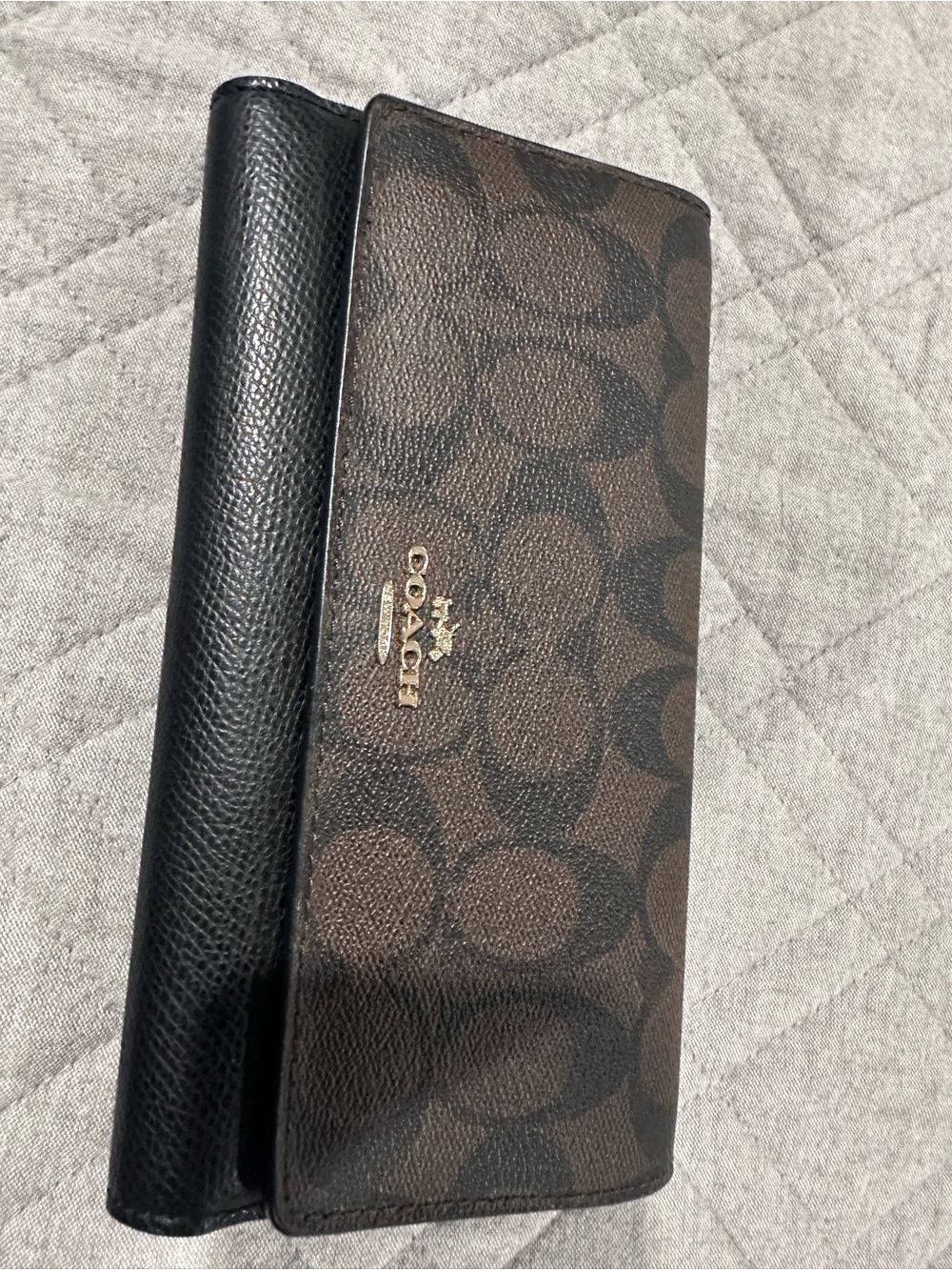 Accessory Clutch/Wallet on Quilted Surface